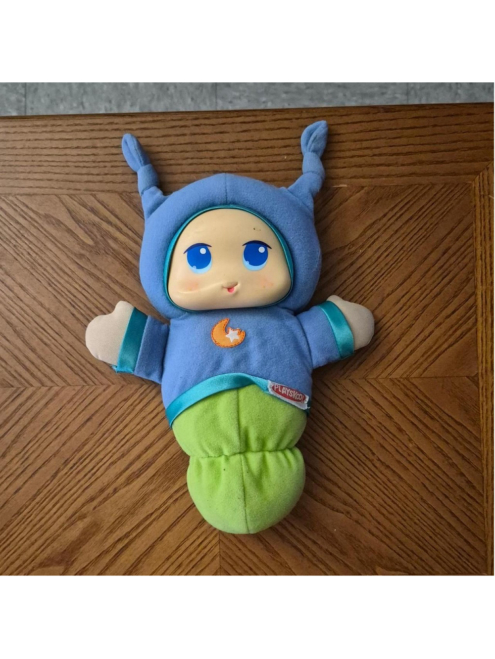 Vinted Playskool glow worm doll with blue eyes and a star on its chest
